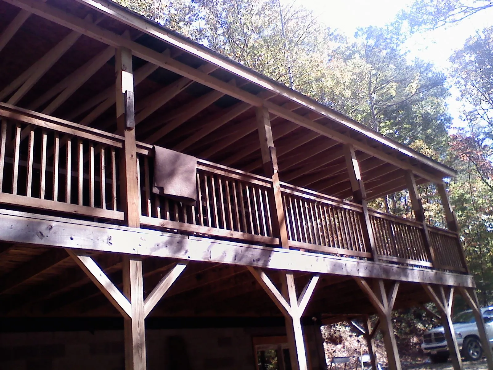 Timber framing under a new elevated porch and deck — Roof Leak Repair in Weems by Roofing Brothers